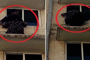 Dramatic Rescue of Woman Trapped on Apartment Roof Captured on Video 