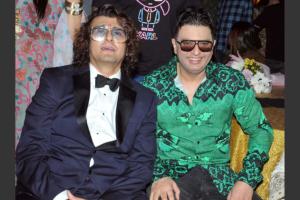 Sonu Nigam hugs Bushan Kumar after feud on 50th b'day bash