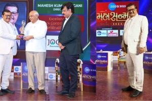 Mahesh Kumar Jogani of Jogani Reinforcement proudly accepts a prestigious award presented by the Honorable Chief Minister of Gujarat, Shri Bhupendra Patel