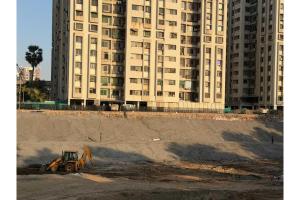 Families return to Shiv Residency as experts declare structure safe following D-wall collapse in Surat