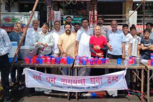 Surat: Distribution of Shital Gulab Sharbat with the message 'Service is the greatest religion